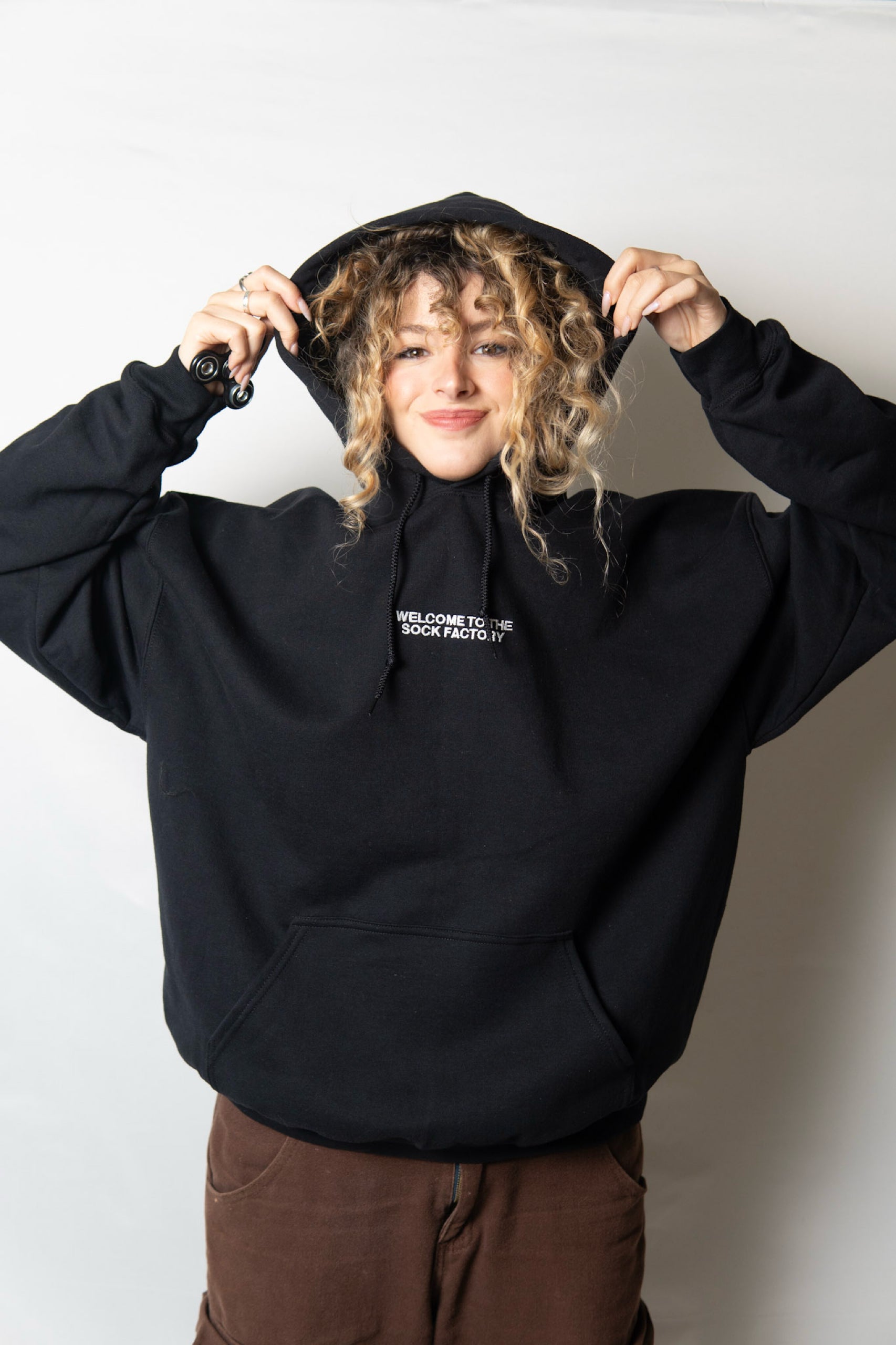 welcome to the sock factory hoodie